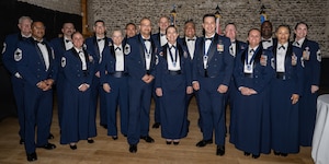 Team Mildenhall chief master sergeants and chief selects pose for a photo during the Royal Air Force Mildenhall chief recognition ceremony at Newmarket, England, April 20, 2024.
