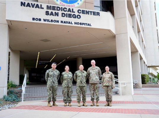 Uniformed Services University of Health Science Brigade leadership and Naval Medical Center San Diego team members pose for a group photo at NMCSD, April 24, 2024. Navy Medicine Readiness and Training Command San Diego’s mission is to prepare service members to deploy in support of operational forces, deliver high quality healthcare services and shape the future of military medicine through education, training and research. NMRTC San Diego employs more than 6,000 active duty military personnel, civilians and contractors in Southern California to provide patients with world-class care anytime, anywhere. (U.S. Navy photo by Mass Communication Specialist 2nd Celia Martin)