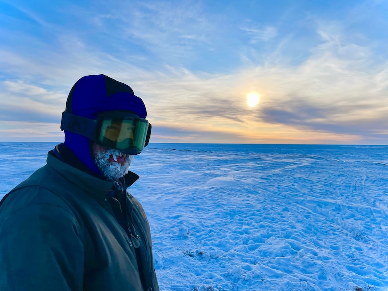 ERDC Cold Regions Research and Engineering Laboratory research geographer Jon Maakestad pictured after a long day of instrumenting atmospheric and soil sensors during fieldwork conducted Utqiagvik, Alaska, for the Integrated Support for Operations in Polar Seas project.