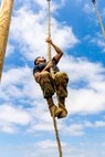 A U.S. Marine Corps candidate climbs a rope during a Mini-Officer Candidates School event at Marine Corps Base Camp Pendleton in Oceanside, Calif., April 20. Mini OCS gives candidates and applicants an idea of what to expect at Marine Corps Officer Candidates School. (U.S. Marine Corps photo by Staff Sgt. Courtney G. White)