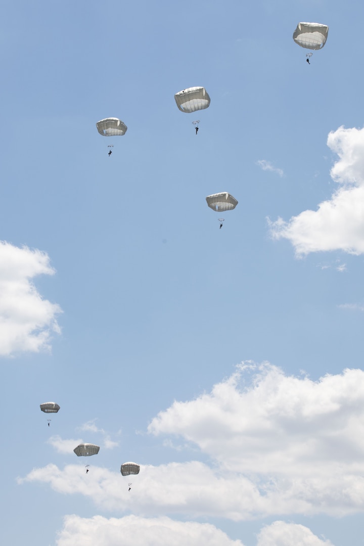 U.S. Army Soldiers conduct static line airborne jumps out of a C-130 Hercules cargo plane during the Joint Parachute Operational Mishap Preventative Orientation Course Enhanced (POMPOC-E) April 25, 2024, at the Plantation Airpark, Sylvania, Georgia.