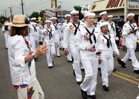 SAN ANTONIO - (April 26, 2024) – More than 100 Sailors within Joint Base San Antonio (JBSA) took part in the Battle of Flowers Parade held during Fiesta San Antonio. The Battle of Flowers Parade is the oldest event and largest parade of Fiesta San Antonio attracting crowds of more than 350,000. Leading the Sailors in the parade was Rear Adm. Walter Brafford, commander, Naval Medical Forces Support Command (NMFSC). Other commands participating included but not limited to Naval Medical Research Unit (NAMRU) San Antonio, Navy Talent Acquisition Group (NTAG) San Antonio, Navy Medicine Training Support Center (NMTSC), and Navy Wounded Warrior (NWW) Program, Navy Reserve Center (NRC) San Antonio, and USS San Antonio (LPD 17). Joint Base San Antonio is proud to be part of the diverse and vibrant community of San Antonio also known as Military City USA. (U.S. Navy Photo by Burrell Parmer, Naval Medical Research Unit San Antonio Public Affairs/Released)