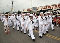 SAN ANTONIO - (April 26, 2024) – More than 100 Sailors within Joint Base San Antonio (JBSA) took part in the Battle of Flowers Parade held during Fiesta San Antonio. The Battle of Flowers Parade is the oldest event and largest parade of Fiesta San Antonio attracting crowds of more than 350,000. Leading the Sailors in the parade was Rear Adm. Walter Brafford, commander, Naval Medical Forces Support Command (NMFSC). Other commands participating included but not limited to Naval Medical Research Unit (NAMRU) San Antonio, Navy Talent Acquisition Group (NTAG) San Antonio, Navy Medicine Training Support Center (NMTSC), and Navy Wounded Warrior (NWW) Program, Navy Reserve Center (NRC) San Antonio, and USS San Antonio (LPD 17). Joint Base San Antonio is proud to be part of the diverse and vibrant community of San Antonio also known as Military City USA. (U.S. Navy Photo by Burrell Parmer, Naval Medical Research Unit San Antonio Public Affairs/Released)
