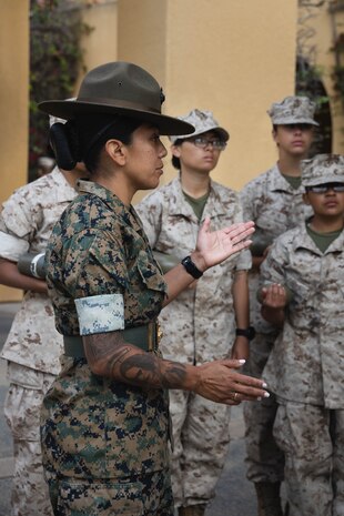 U.S. Marine Corps Staff Sgt. Esmeralda Ibanez, a drill instructor with Lima Company, 3rd Recruit Training Battalion, briefs recruits before exam one at Marine Corps Recruit Depot San Diego, California, April 24, 2024. The recruits learned how to apply aid to a variety of injuries and how to assemble and disassemble their rifles. Recruits have several opportunities to practice before exam one and the practical application test. (U.S. Marine Corps photo by Lance Cpl. Janell B. Alvarez)