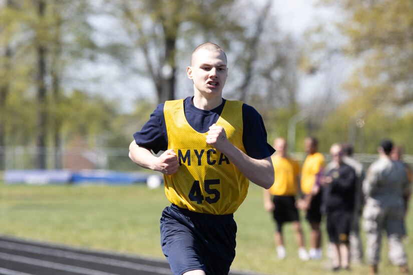 A cadet from Michigan's Battle Creek Youth ChalleNGe Academy runs during a track meet on Thursday, April 25.