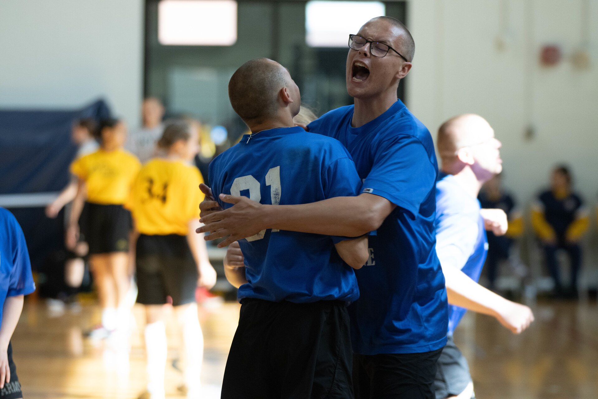 Bluegrass ChalleNGe Academy cadets celebrate as their team wins a volleyball match Friday, April 26.