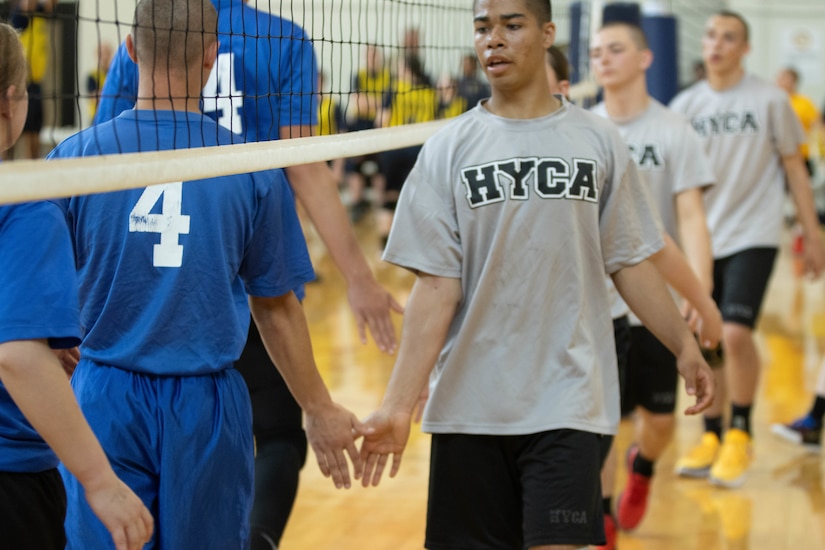 Cadets from Bluegrass ChalleNGe Academy and Hoosier Youth ChalleNGe Academy congratulate each other following a volleyball match Friday, April 26.