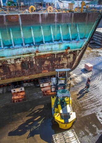 Old Caisson 3 sits in Dry dock 3 at Puget Sound Naval Shipyard and Intermediate Facility in Bremerton, Washington, Sept. 27, 2019. Project team members from Shops 11, 17 and 75 are using a 'cold-cutting' technique during the caisson dismantling and recycling project. (U.S. Navy photo by Wendy Hallmark)