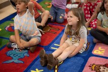 The Lorax Reads to Students to Celebrate Earth Day and the Month of the Military Child