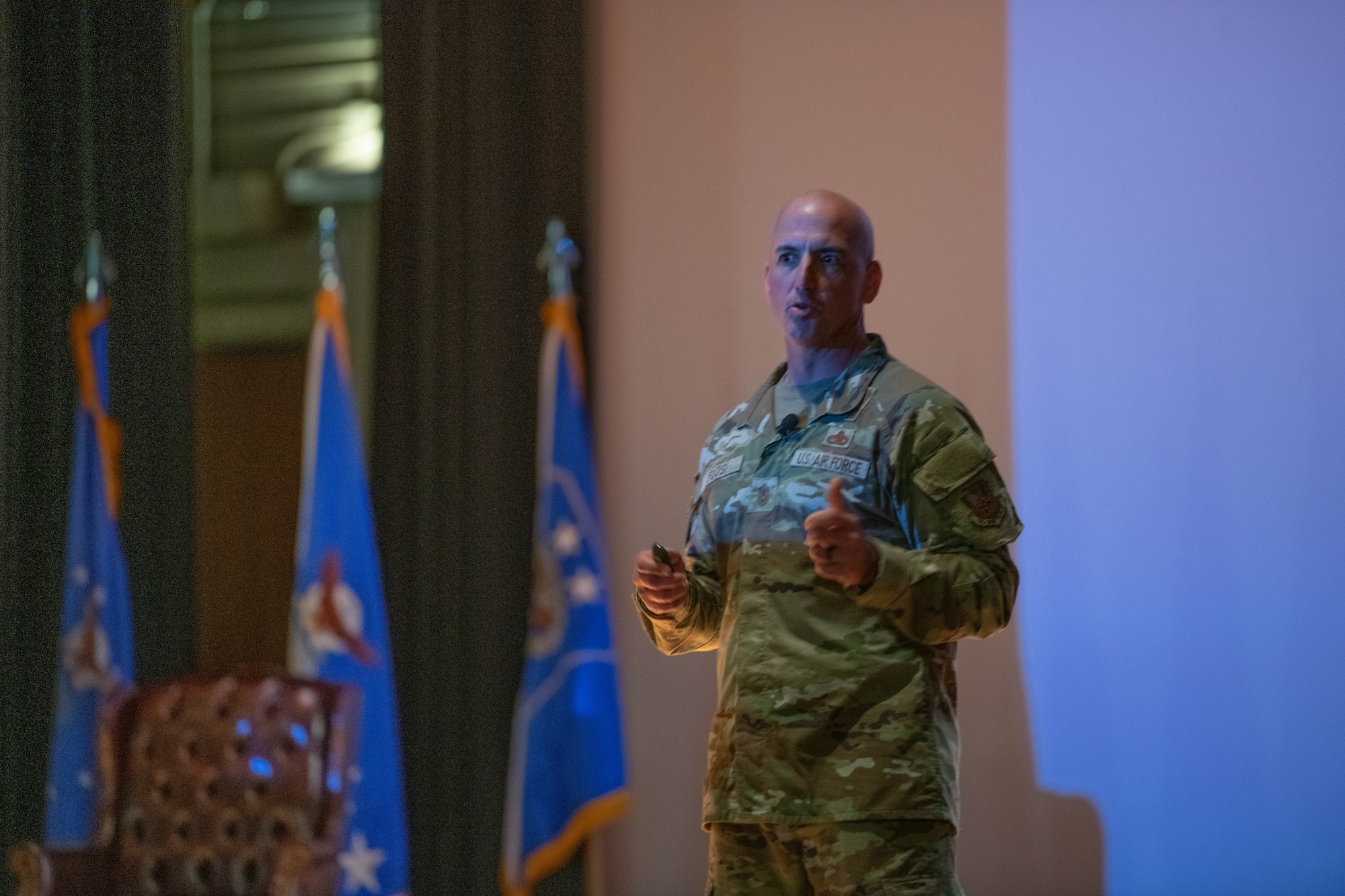 Chief Master Sgt. of the Air Force David Flosi delivers remarks during an all call at Joint Base Charleston, South Carolina, April 26, 2024. During the all call, Allvin and Flosi addressed the need for rapid reoptimization of forces to effectively confront great power competition. (U.S. Air Force photo by Senior Airman Christian Silvera)