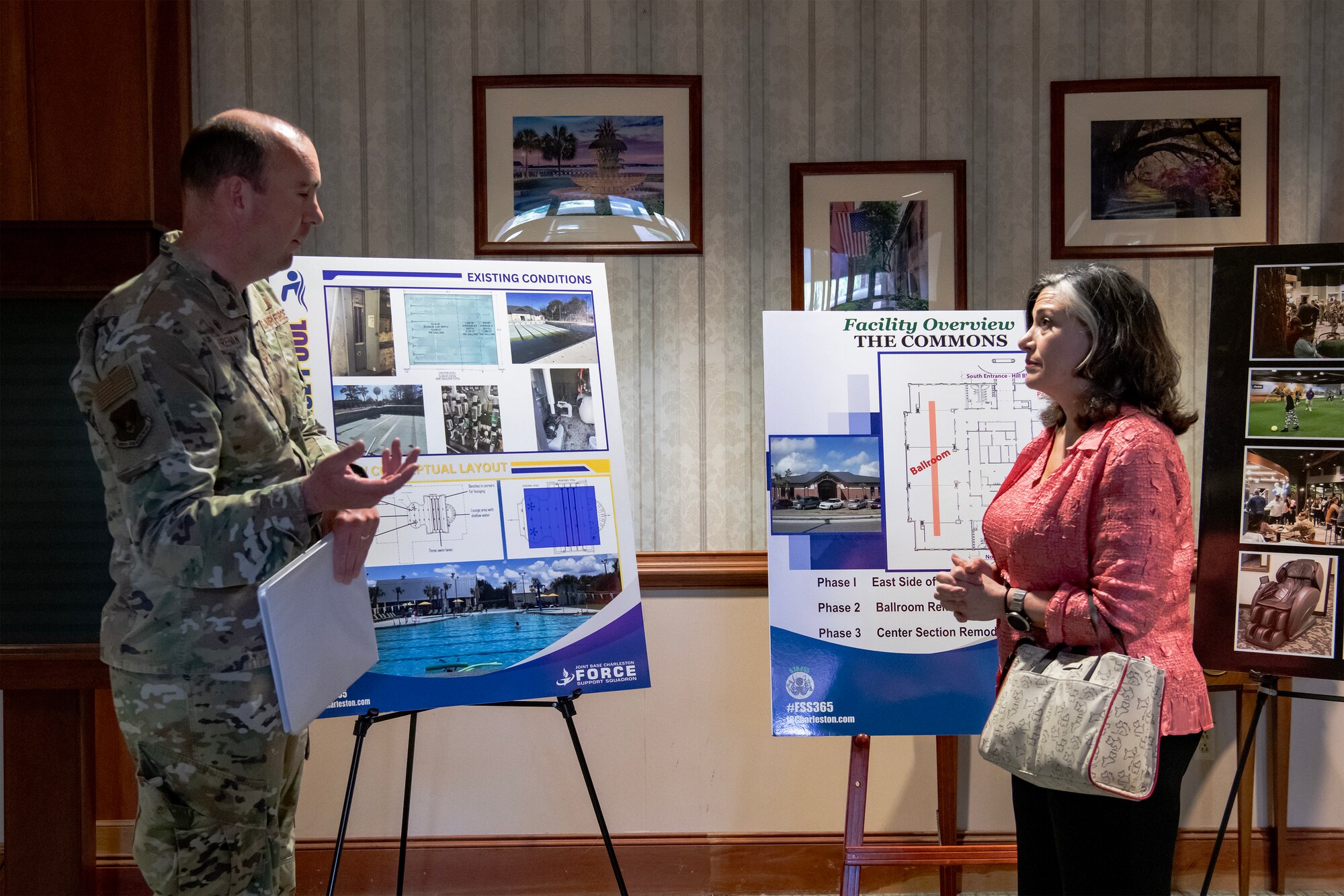 Mrs. Gina Allvin, the spouse of U.S. Air Force Chief of Staff Gen. David Allvin, right, and Col. Michael Freeman, 628th Air Base Wing and Joint Base Charleston commander, discuss Airmen and family quality-of-life initiatives during a tour of The Commons at Joint Base Charleston, South Carolina, April 26, 2024. The tour presented Joint Base Charleston's vision for a centralized hub to cultivate a united community and foster meaningful connections. (U.S. Air Force photo by Airman 1st Class Carl Good)