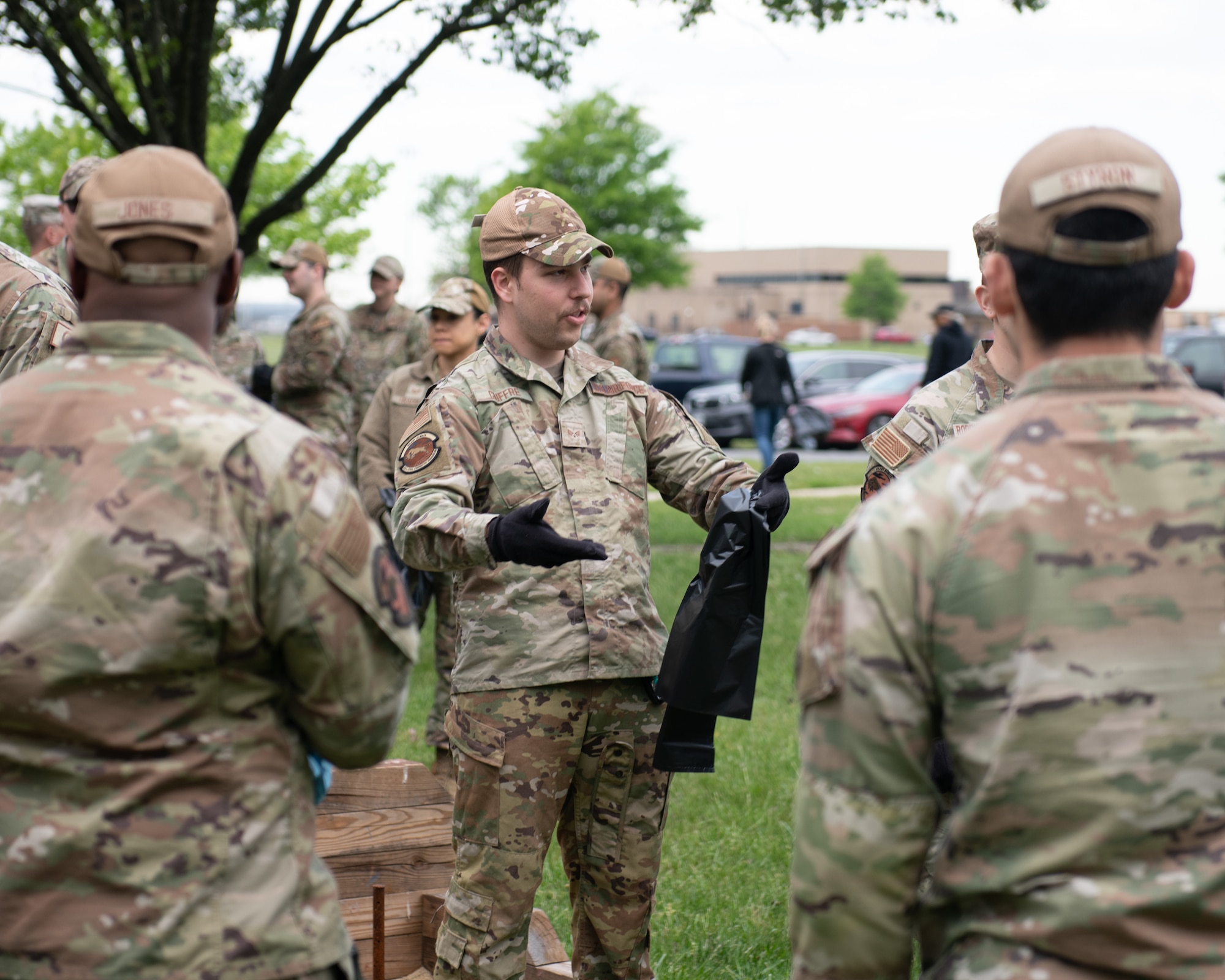 U.S. Air Force Airmen coordinate a plan of action for the base wide cleanup.