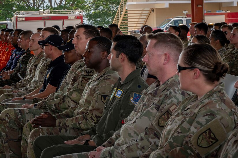 A photo of service members sitting.