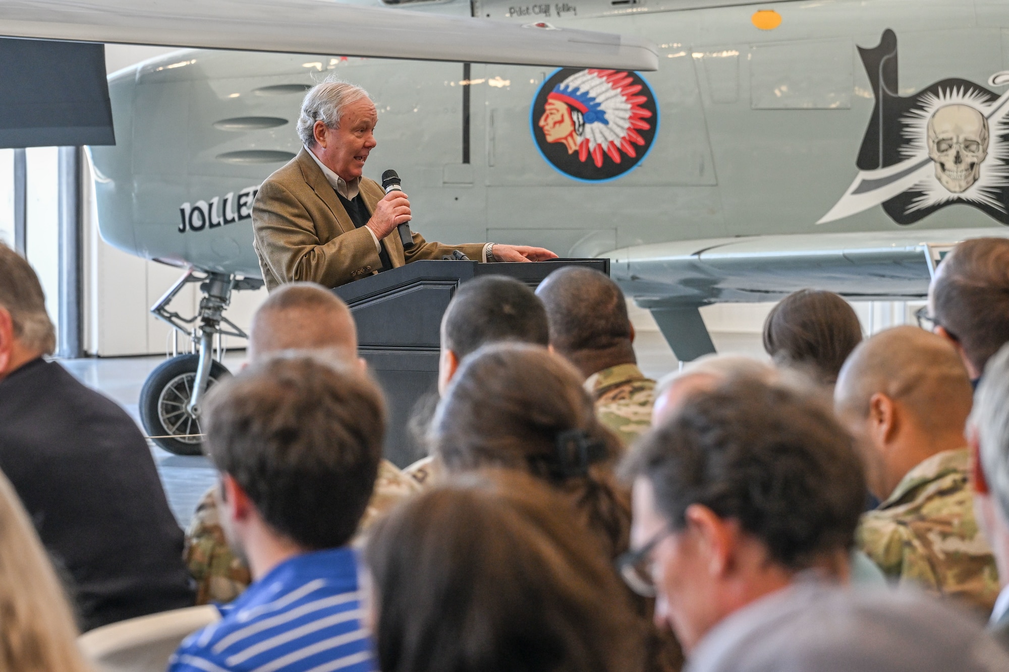 Retired Air Force Maj. Gen. Kevin Sullivan, Aerospace Heritage Foundation of Utah chairman, speaks at the ribbon cutting ceremony of the new L.S. Skaggs Gallery at the Hill Aerospace Museum at Hill Air Force Base, Utah, April 29, 2024. The new gallery is a 91,000 square foot hangar and provides a 70% increase to the indoor exhibition space. (U.S. Air Force photo by Cynthia Griggs)