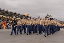 U.S. Marines with Golf Company, 2nd Recruit Training Battalion march on the parade deck during a graduation ceremony at Marine Corps Recruit Depot San Diego, California, April 26, 2024. Graduation took place at the completion of the 13-week transformation, which included training for drill, marksmanship, basic combat skills, and Marine Corps customs and traditions. (U.S. Marine Corps photo by Lance Cpl. Alexandra M. Earl)