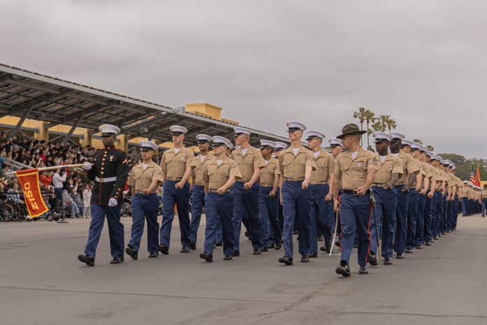 U.S. Marines with Golf Company, 2nd Recruit Training Battalion march on the parade deck during a graduation ceremony at Marine Corps Recruit Depot San Diego, California, April 26, 2024. Graduation took place at the completion of the 13-week transformation, which included training for drill, marksmanship, basic combat skills, and Marine Corps customs and traditions. (U.S. Marine Corps photo by Lance Cpl. Alexandra M. Earl)