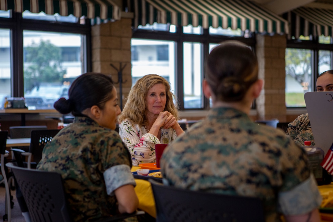 Robin Kelleher, a representative from the Defense Advisory Committee on Women in the Services, discusses the role women play in the Marine Corps during a luncheon with U.S. Marines stationed on Marine Corps Air Station Miramar, on MCAS Miramar, California, April 22, 2024. Marines with MCAS Miramar and the 3rd Marine Aircraft Wing hosted DACOWITS members from April 22-23, to support research on service member experiences, attitudes, and recommendations for recruitment and retention of women in the Marine Corps. (U.S. Marine Corps photo by Pfc. Seferino Gamez)