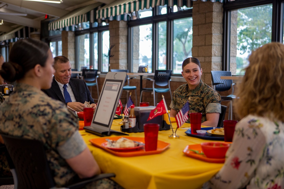 U.S. Marine Corps Lance Cpl. Jennae Kahler, an F-35B Lightning II aircraft electrical systems technician with Marine Fighter Attack Squadron (VMFA) 311, Marine Aircraft Group 11, 3rd Marine Aircraft Wing, discusses the role women play in the Marine Corps during a luncheon with representatives from the Defense Advisory Committee on Women in the Services on MCAS Miramar, California, April 22, 2024. The purpose of the luncheon was to conduct research on behalf of Lloyd J. Austin III, the Secretary of Defense, in an informal setting. (U.S. Marine Corps photo by Pfc. Seferino Gamez)