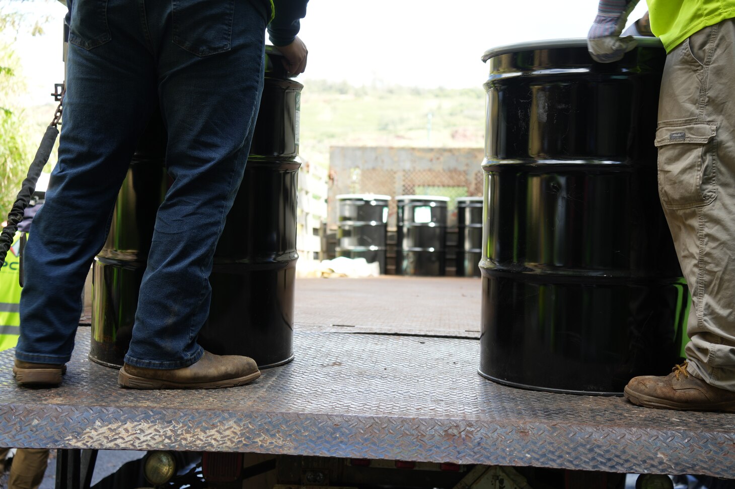 HALAWA, Hawaii (April 23, 2024) Navy Closure Task Force-Red Hill (NCTF-RH) contractors load barrels of aqueous film-forming foam (AFFF) concentrate onto a truck outside the Red Hill Bulk Fuel Storage Facility (RHBFSF) in Halawa, Hawaii, April 23, 2024. NCTF-RH removed thirty-two 55-gallon barrels of AFFF concentrate which will be transported to a treatment facility off island for disposal. Charged with the safe decommissioning of the RHBFSF, NCTF-RH was established by the Department of the Navy as a commitment to the community and the environment. The Navy continues to engage with the people of Hawaii, regulatory agencies, and other stakeholders as NCTF-RH works to safely and deliberately decommission the RHBFSF. (U.S. Navy photo by Mass Communication Specialist 1st Class Glenn Slaughter)