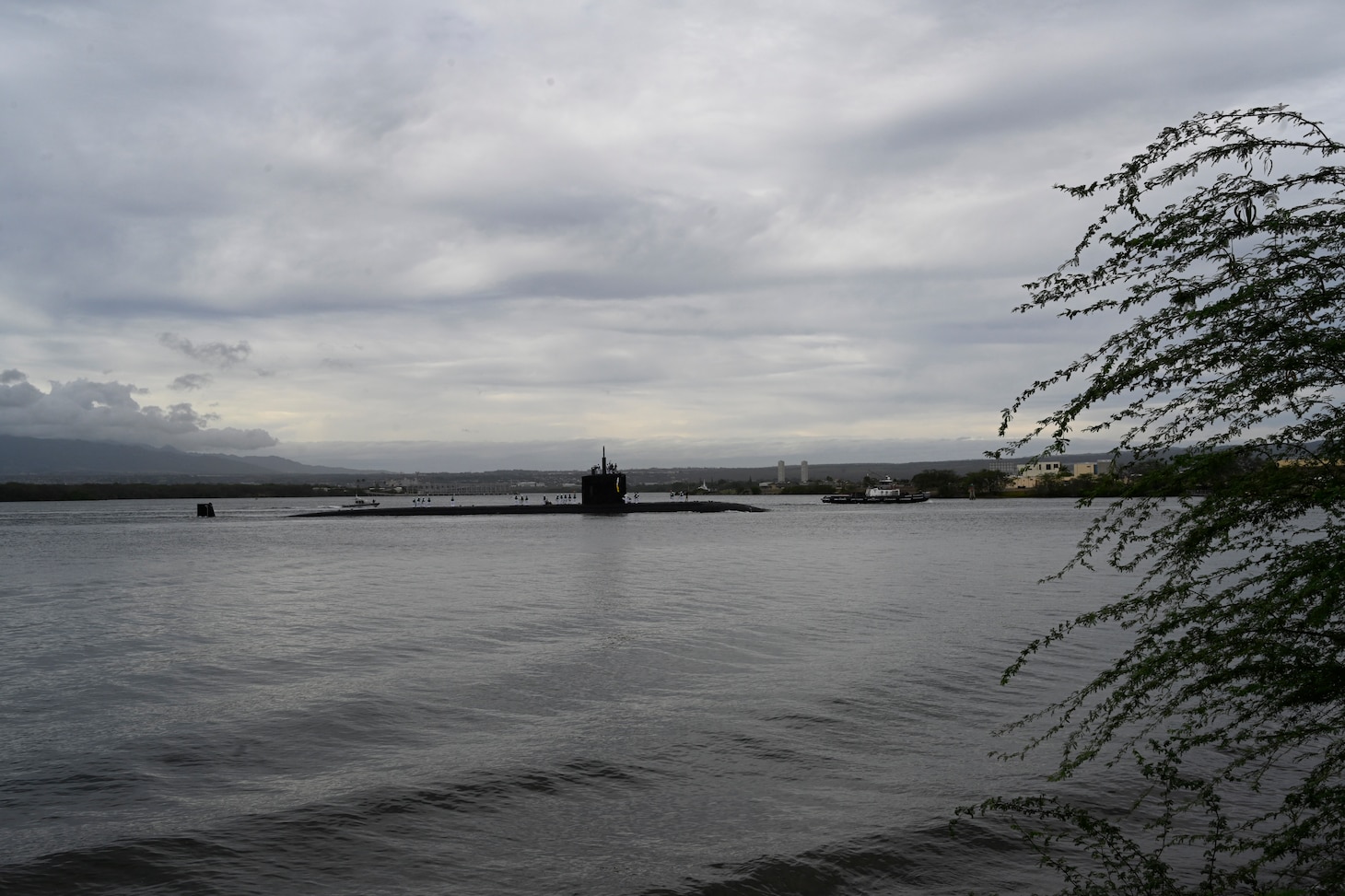 The Los Angeles-class fast-attack submarine USS Topeka (SSN 754) returns to Joint Base Pearl Harbor-Hickam after completing a deployment, Nov. 30. (U.S. Navy photo by Lorilyn Cravalho)