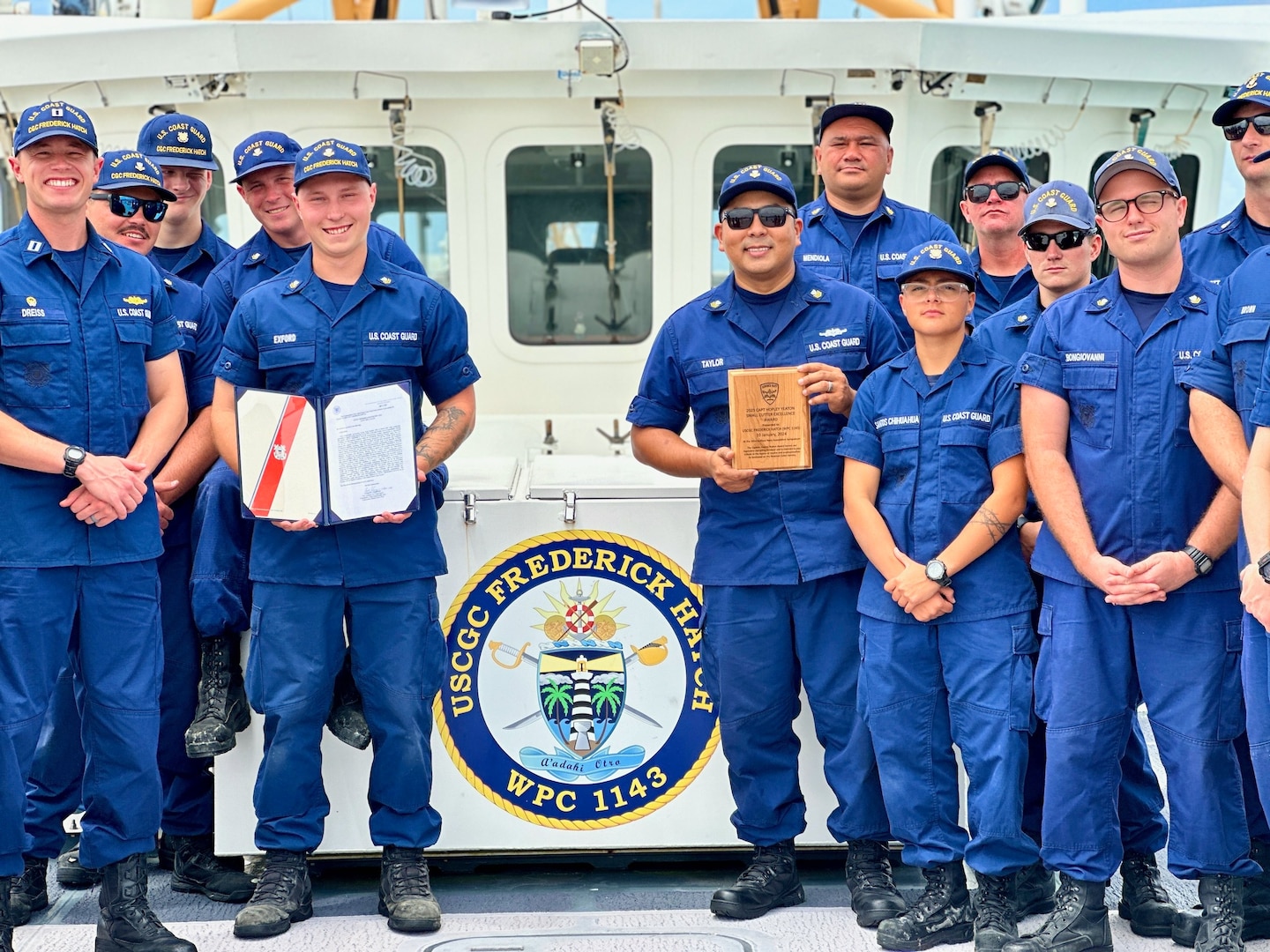 A portion of the crew of the USCGC Frederick Hatch (WPC 1143) stands for a photo on March 14, 2024, in Santa Rita, Guam. In January 2024, the Surface Navy Association National Symposium in Washington, D.C., was marked by the commendation of the USCGC Frederick Hatch (WPC 1143) crew as the recipient of the prestigious 2023 Hopley Yeaton Cutter Excellence Award (Small). This accolade recognizes operational efficiency and pays tribute to the spirit of pioneering leadership and maritime governance that defines the U.S. Coast Guard. (U.S. Coast Guard photo by Chief Warrant Officer Sara Muir)