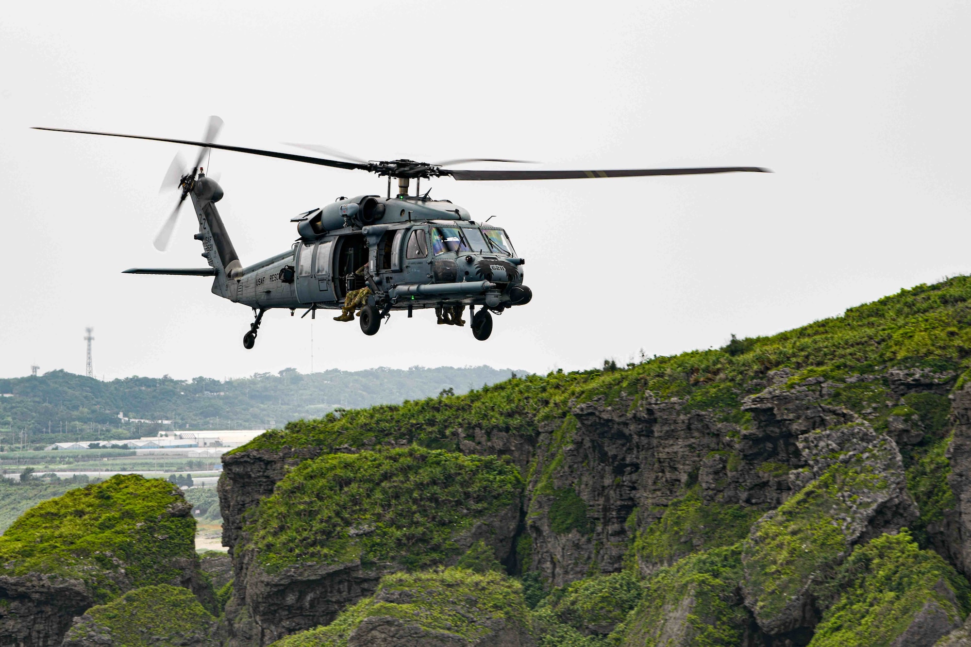 A U.S. Air Force HH-60G Pave Hawk assigned to the 33rd Rescue Squadron flies over Okinawa, Japan, April 16, 2024.