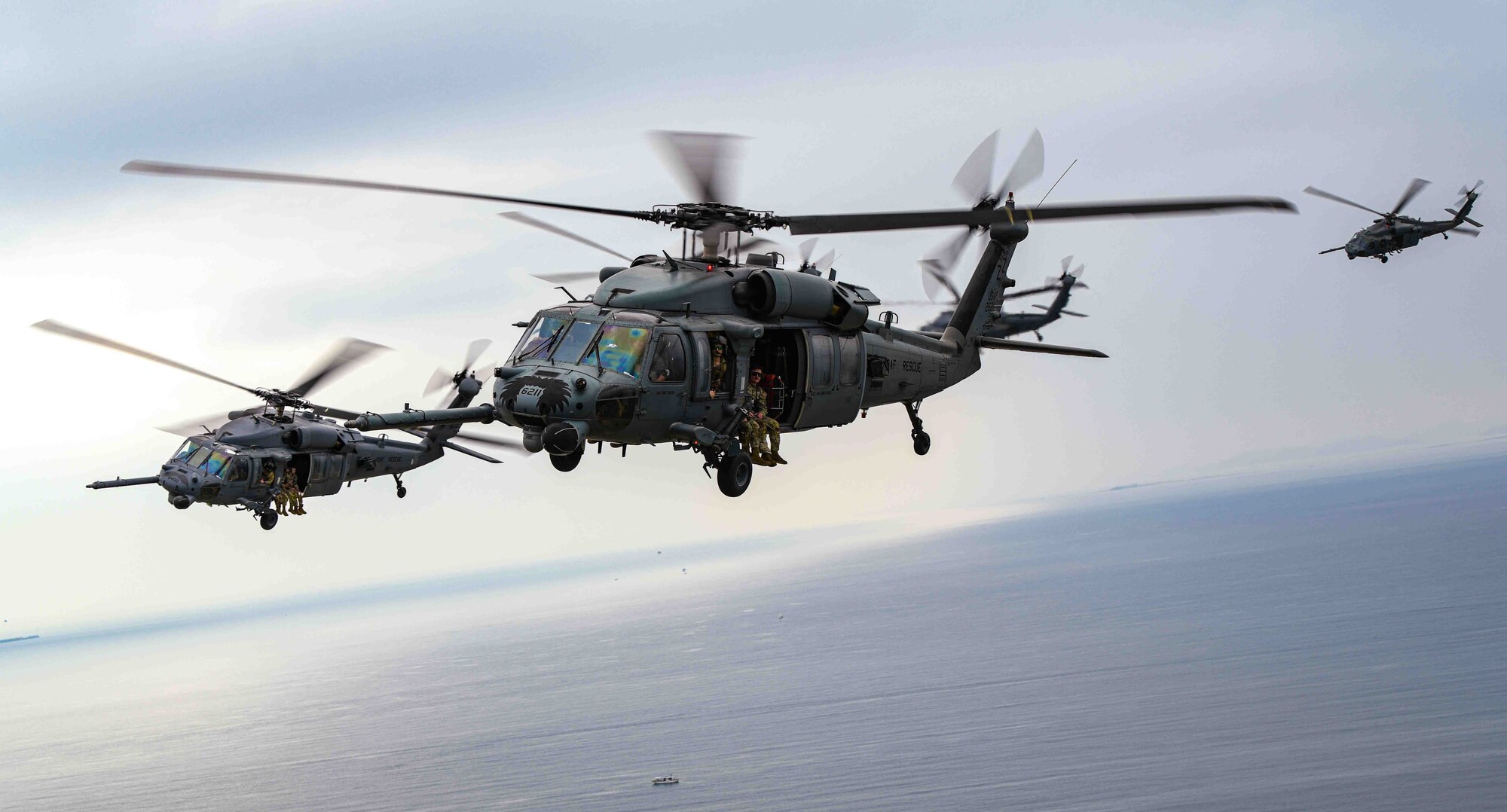 U.S. Air Force HH-60G Pave Hawks assigned to the 33rd Rescue Squadron fly in formation over Okinawa, Japan, April 16, 2024.