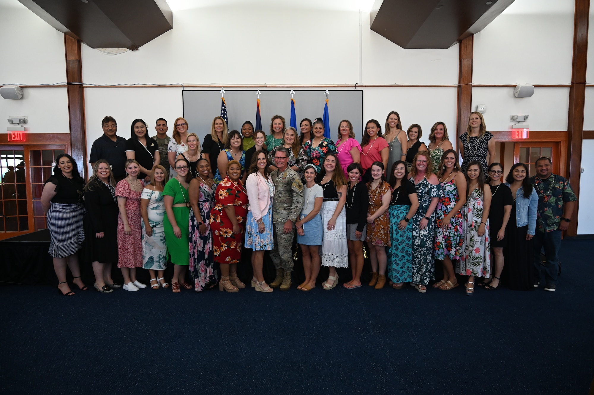 Key Spouse members along with the commander of the 36th Wing pose for a group photo.