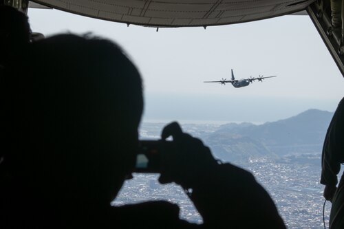 U.S. Air Force Airmen and Japanese community leaders in a C-130J Super Hercules