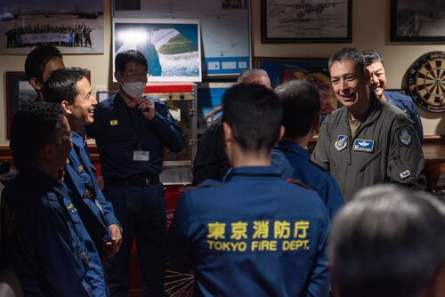 U.S. Air Force Airmen and Japanese community leaders in a C-130J Super Hercules