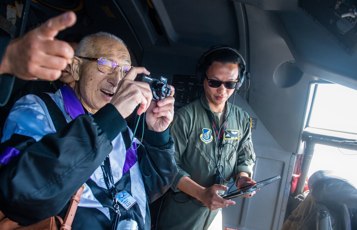 U.S. Air Force Airmen and Japanese community leaders in a C-130J Super Hercules