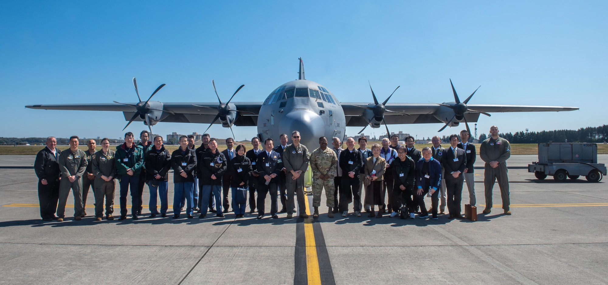 U.S. Air Force Airmen and Japanese community leaders in a C-130J Super Hercules
