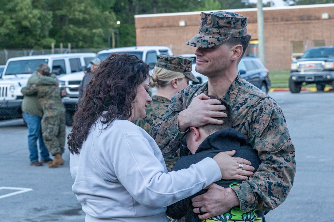 U.S. Marine Corps 1st Lt. Gerard Maurer, a logistics officer with Combat Logistics Battalion 6, Combat Logistics Regiment 2, 2nd Marine Logistics Group, reunites with his families after returning from a seven- month deployment as part of Marine Rational Forces Europe area of operations on Camp Lejeune, North Carolina April 24, 2024. CLB 6 returned from their deployment to Finland and Norway which focused on regional engagements by conducting various exercises, arctic cold-weather and mountain warfare training with allied and partner nations, in order to foster interoperability between the United States and its allies.  (U.S. Marine Corps photos by Lance Cpl. Christian Salazar)
