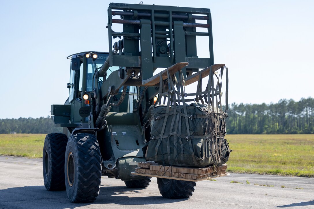 A TRAM 624KR moves recovered cargo during an air delivery training in Surf City, North Carolina, April 26, 2024. 2nd DSB conducted the training to evaluate their Marines' combat effectiveness and enhance air delivery skills in a controlled environment to better prepare the unit for future operations. (U.S. Marine Corps photo by Lance Cpl. Jessica J. Mazzamuto)