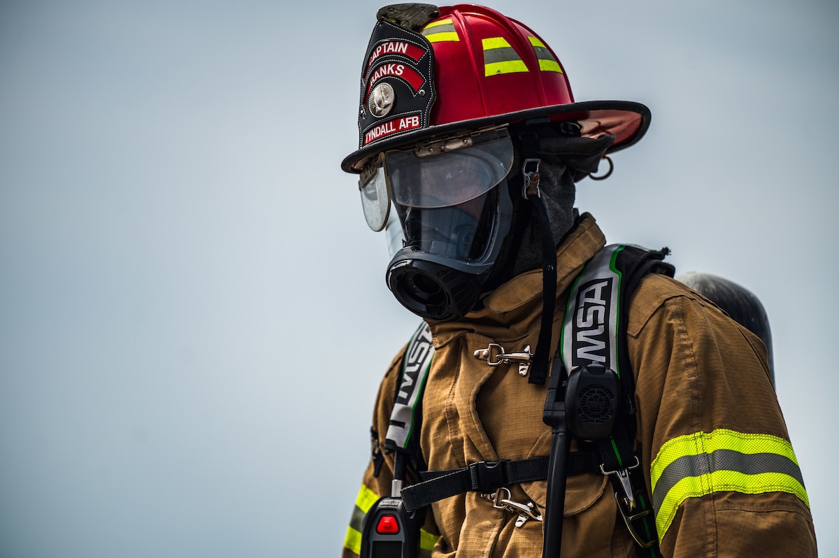 Fire fighter observes scene
