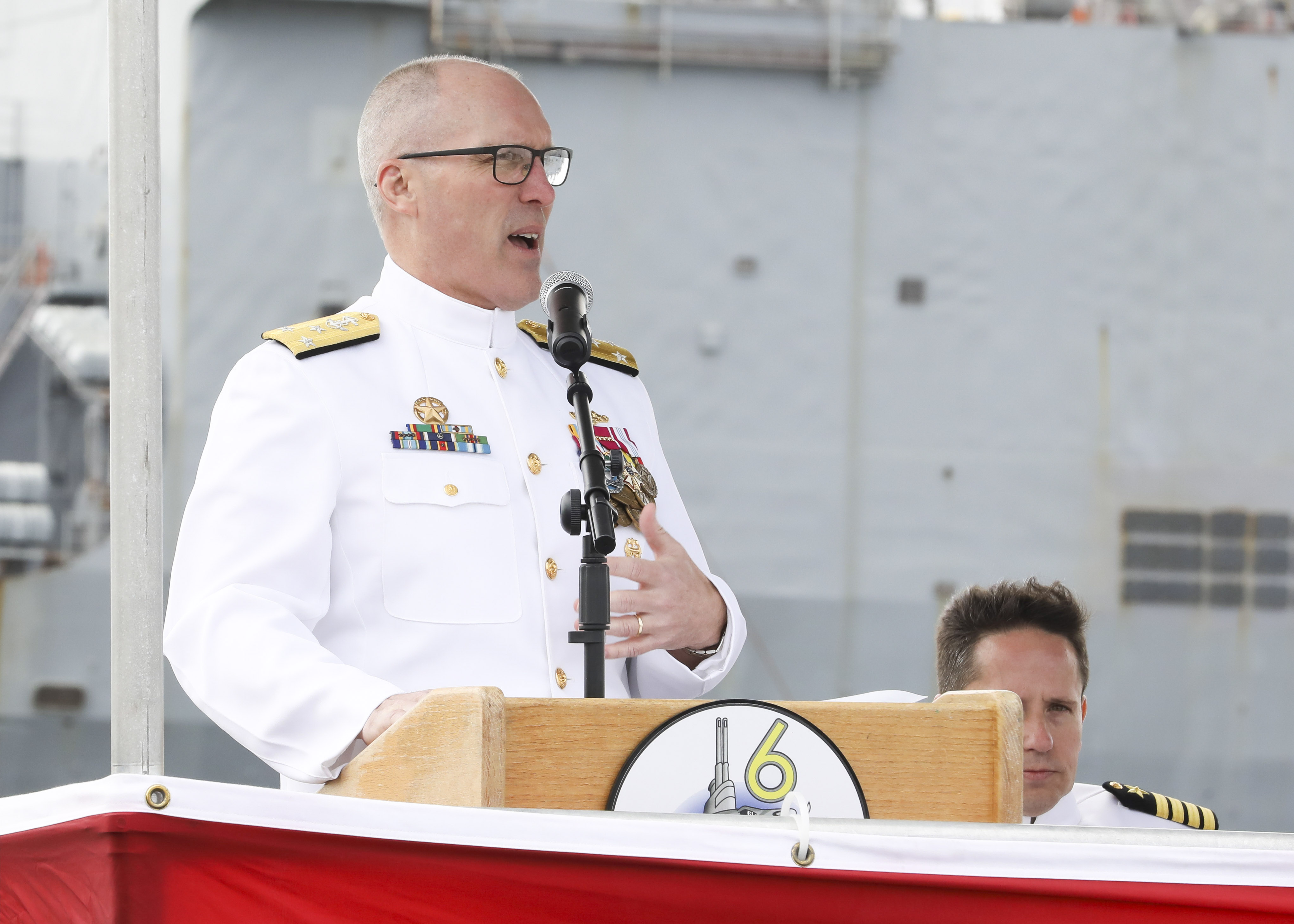 Vice Adm. Rob Gaucher, commander, Submarine Forces, speaks as a guest speaker during the Commander, Submarine Squadron (CSS) SIX change of command ceremony aboard the Los-Angeles class attack submarine USS Helena (SSN 725), April 25.