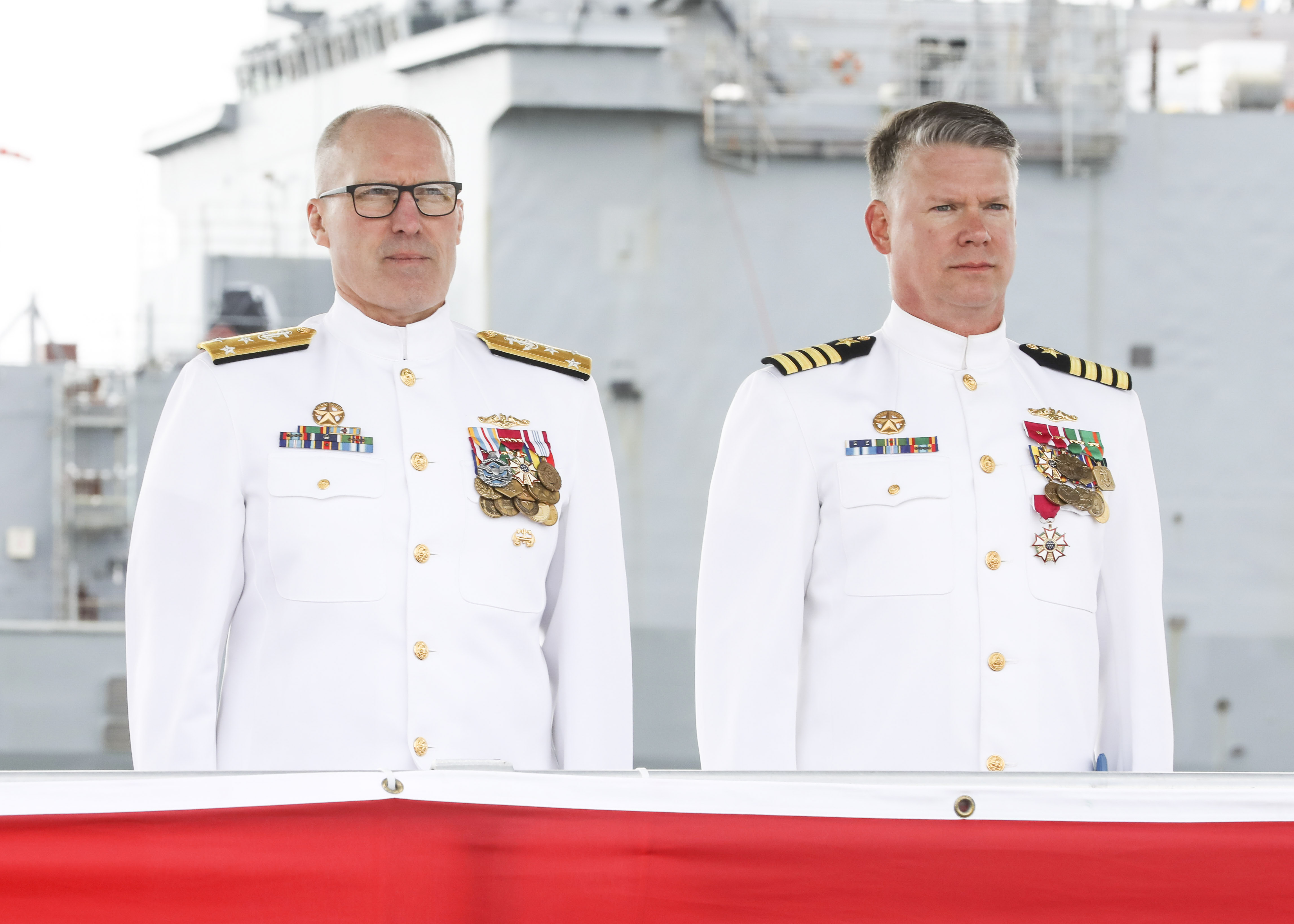 Capt. Jason Pittman, right, commodore, Submarine Squadron (CSS) SIX, is awarded the Legion of Merit Medal from Vice Adm. Rob Gaucher, commander, Submarine Forces, during the Commander, Submarine Squadron (CSS) SIX change of command ceremony aboard the Los-Angeles class attack submarine USS Helena (SSN 725), April 25.