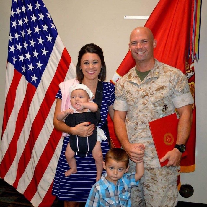 U.S. Marine Corps Major Thomas Coyle stands with Felicia Coyle, his wife; Macie Coyle, his daughter; and Brody Coyle, his son. (Courtesy Photo)