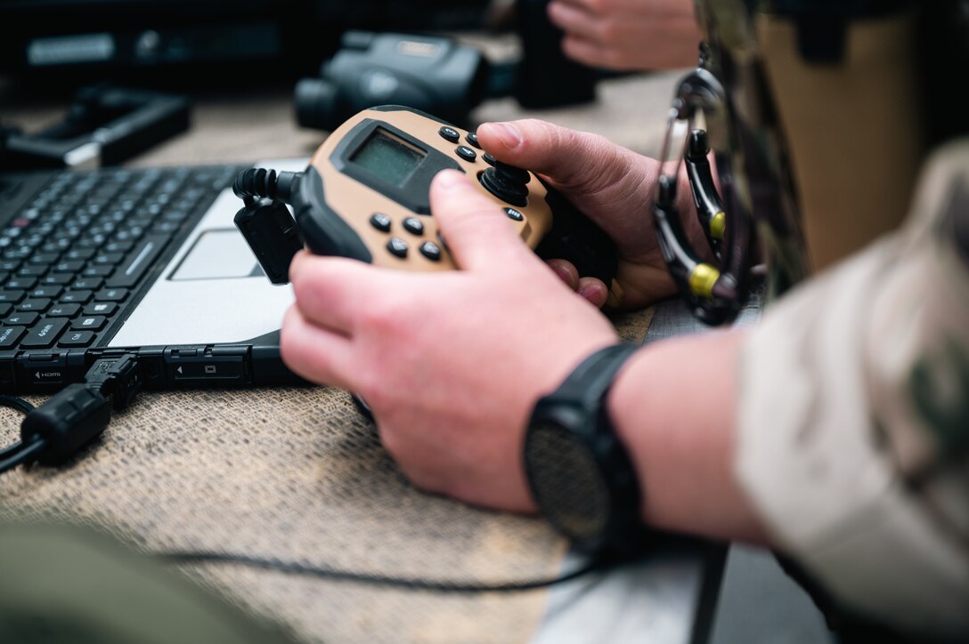 A a tactical controller is held by hands