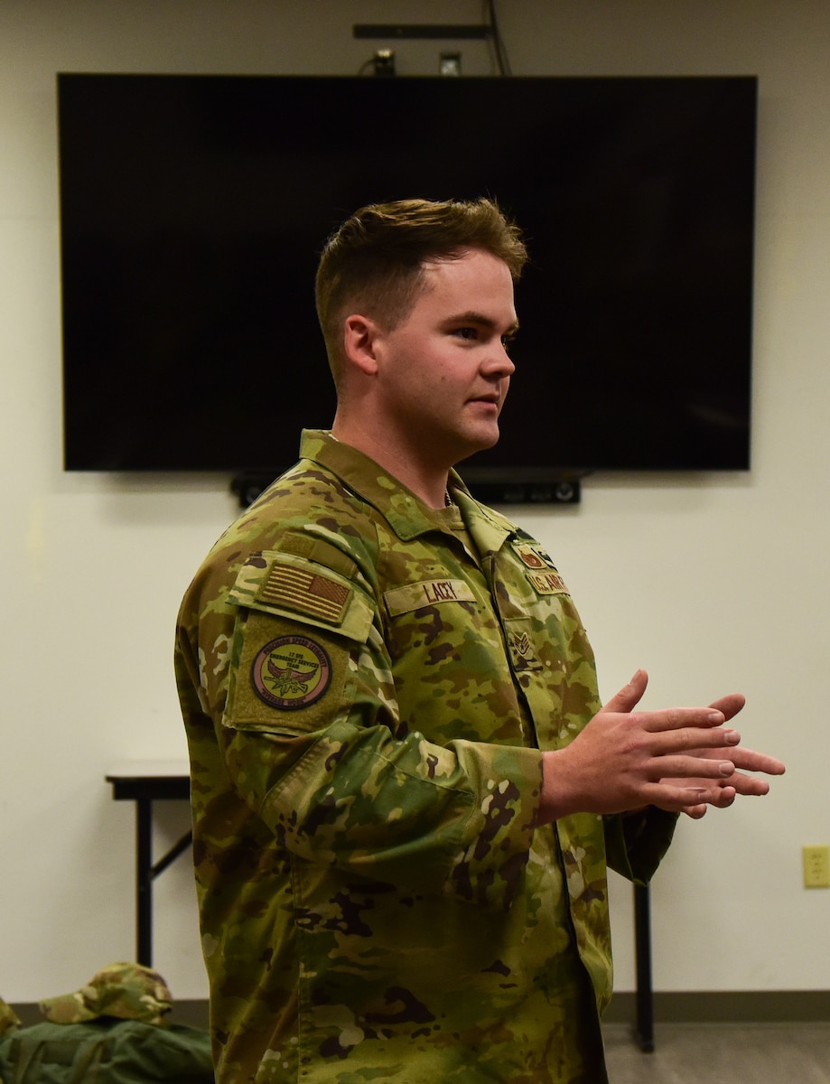 U.S. Air Force Staff Sgt. Josten Lacey, 17th Security Forces Squadron defender, delivers a briefing on the use of force for Expeditionary Readiness Training Course 24-7 at the Installation Deployment Readiness Cell, Goodfellow Air Force Base, Texas, April 11, 2024. Students in the ERT course received instruction in numerous relevant topics, from the law of war and the use of force to current events going on around the world today. (U.S. Marine Corps photo by Cpl. Jessica Roeder)