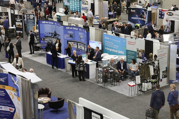 Several booths in a exhibition hall.