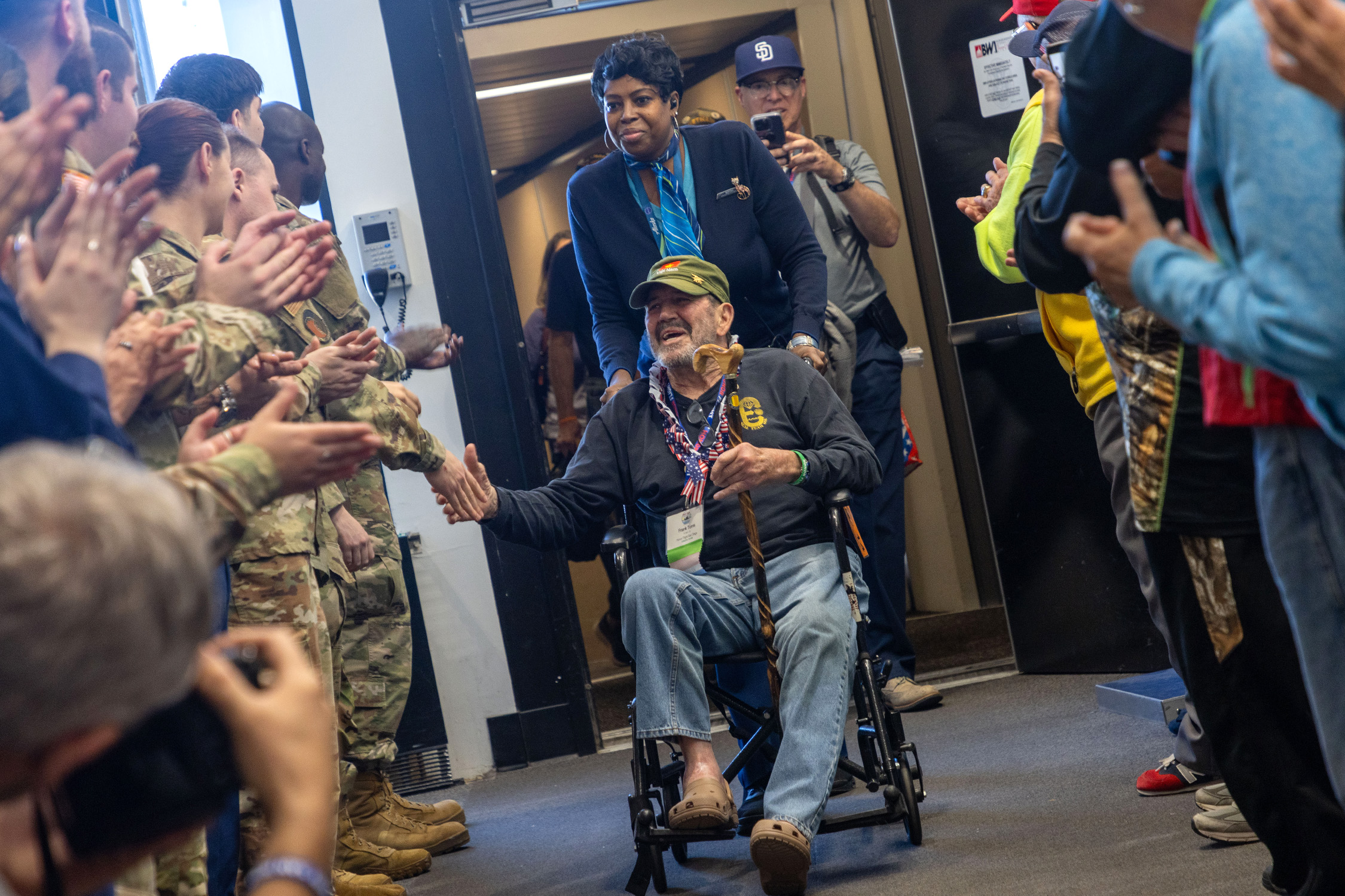 NSW Vietnam veterans are welcomed at Baltimore-Washington International Thurgood Marshall Airport during an Honor Flight.