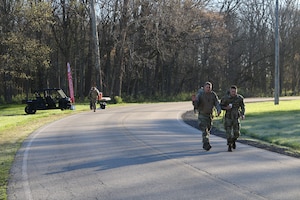 Master Sgt. Ryan Steele and Tech. Sgt. Joel Ford, 445th Security Forces Squadron, were among 100 participants to complete the 18 mile Norwegian foot march hosted by the 88th Security Forces Squadron at Wright-Patterson Air Force Base, Ohio April 6, 2024. The participants carried backpacks weighing at least 25 pounds around the course.