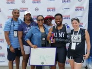 Snypes family celebrates with David and his multiple medals at the 2022 Department of Defense Warrior Games
