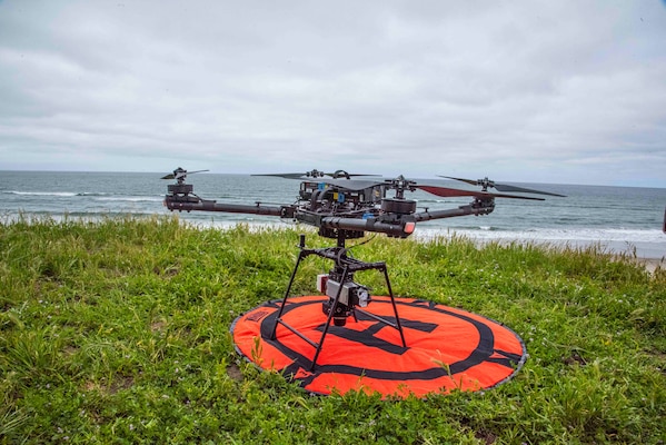 An unmanned aircraft system (UAS) equipped with an infrared LiDAR, or Light Detection and Ranging, sensor, stands ready for deployment near Monterey Bay.