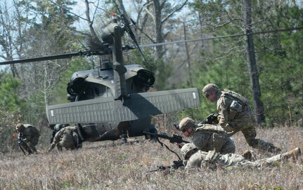 Virginia National Guard Soldiers assigned to the Charlottesville-based Alpha Company, 3rd Battalion, 116th Infantry Regiment, 116th Infantry Brigade Combat Team conduct cold load training with aviation crews assigned to the Sandston-based 2nd Battalion, 224th Aviation Regiment, 29th Infantry Division April 5, 2024, at the Shenandoah Valley Regional Airport in Weyers Cave, Virginia.