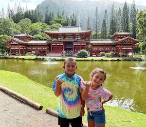 Brody and Macie Coyle pose in front of the Byodo-In Temple in Oahu, Hawaii. (Courtesy Photo)