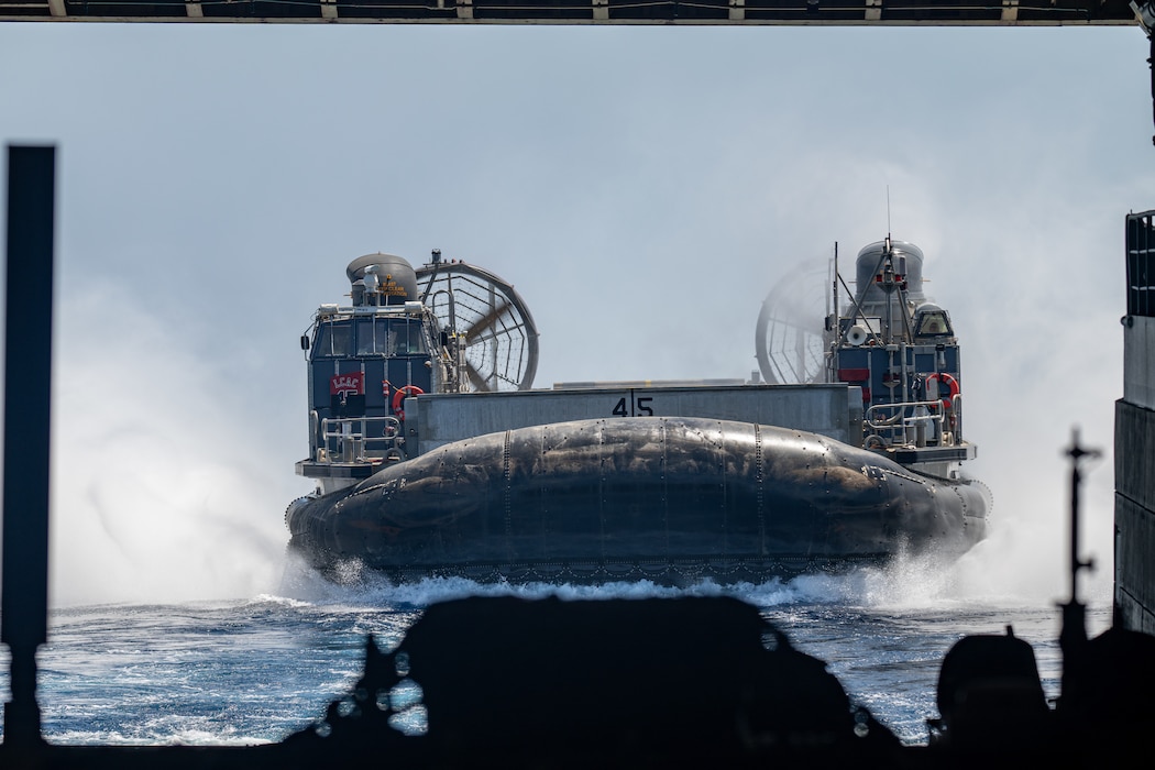 A landing craft, air cushion, approaches the well deck of the San Antonio-class amphibious transport dock ship USS Somerset (LPD 25) during Exercise Balikatan 24
