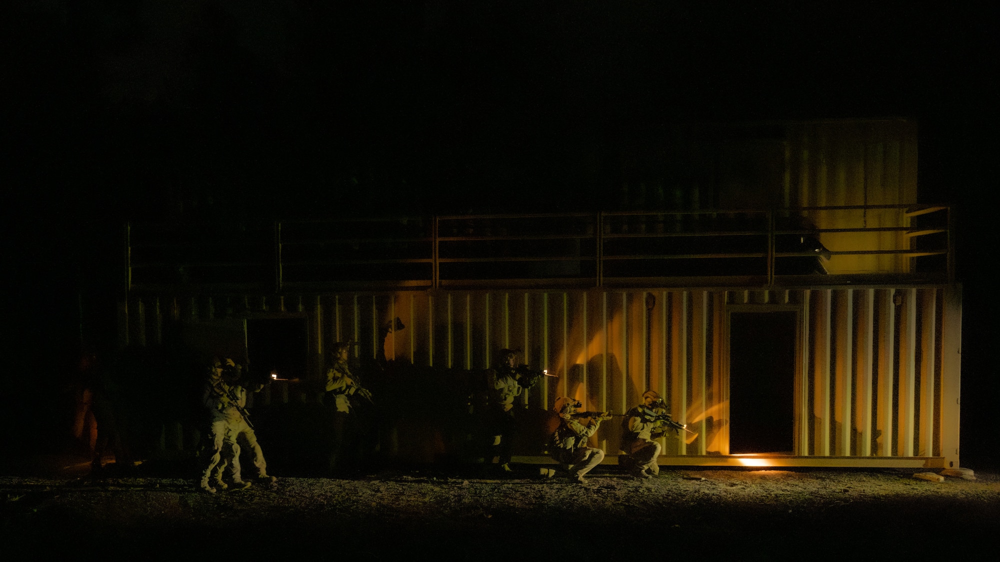 U.S. Air Force Airmen assigned to the 56th Civil Engineer Squadron Explosive Ordnance Disposal flight participate in a night infiltration scenario during exercise Operation Pegasus at Camp Navajo, Arizona, April 21-26, 2024.