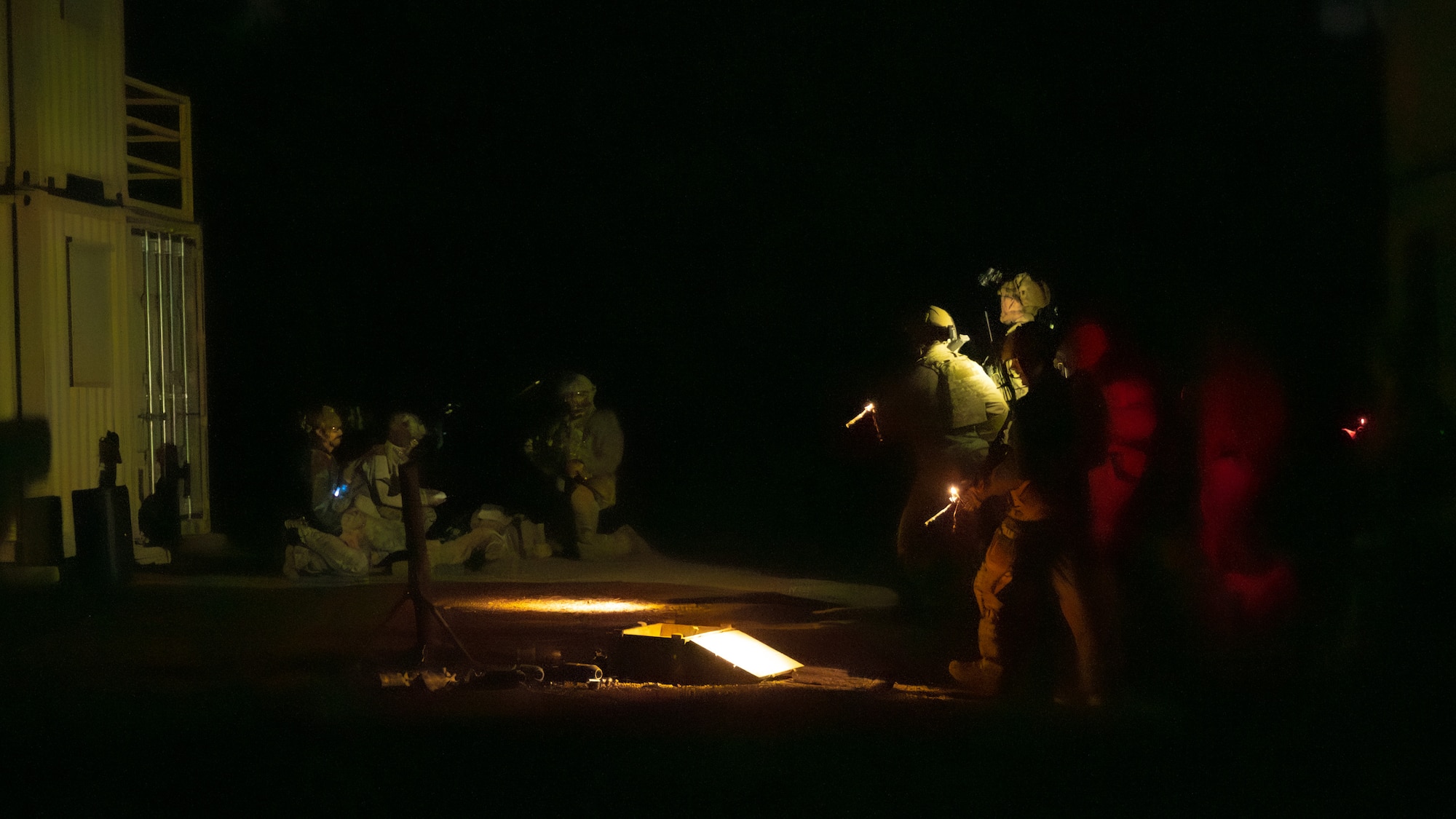 U.S. Air Force Airmen assigned to the 56th Civil Engineer Squadron Explosive Ordnance Disposal flight participate in a night infiltration scenario during exercise Operation Pegasus at Camp Navajo, Arizona, April 21-26, 2024.